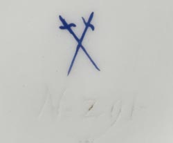 Mark with Two crossed swords and three dots.